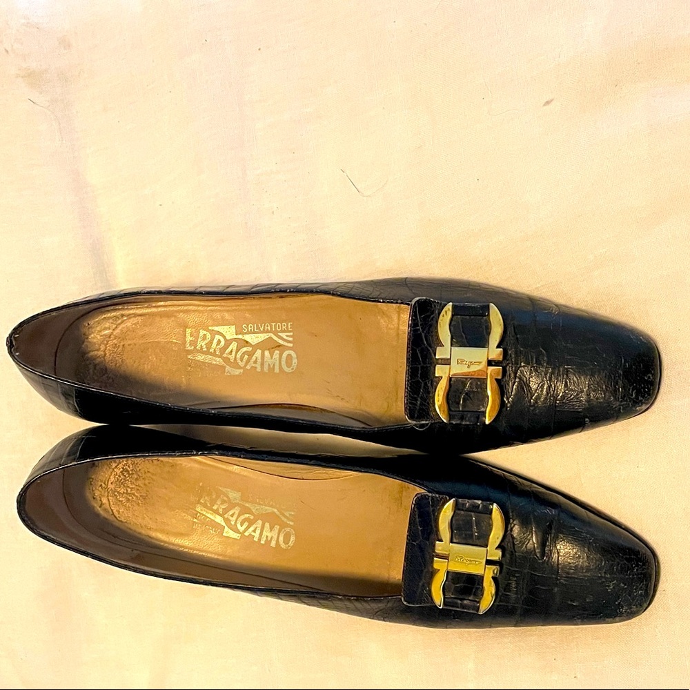 Salvatore Ferragamo black loafers with gold embellished buckle